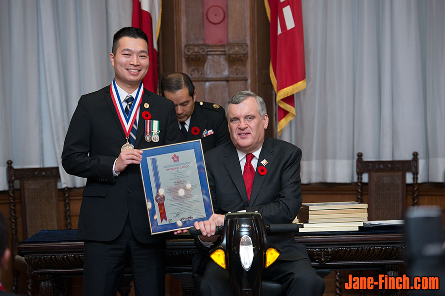 Paul Nguyen receives the National Ethnic Press award from the Lt. Gov. of Ontario, David C. Onley