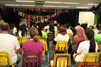 Paul Nguyen congratulates graduates of the Newcomer Orientation Week (NOW) program at Jarvis Collegiate Institute