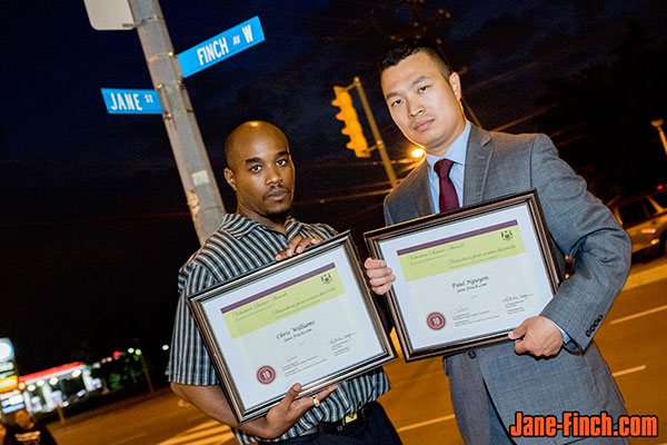 Paul Nguyen and Chris Williams receive the Ontario Volunteer Service Award.