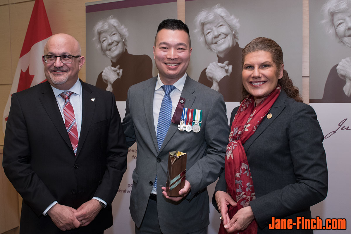 Paul Nguyen receives the June Callwood Award from Minister of Citizenship and Immigration, the honourable Laura Albanese